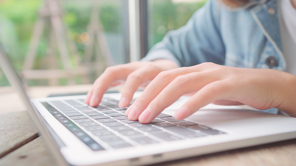 Business freelancer working on laptop